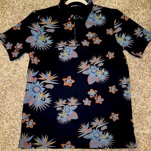 Travis Matthew golf polo.